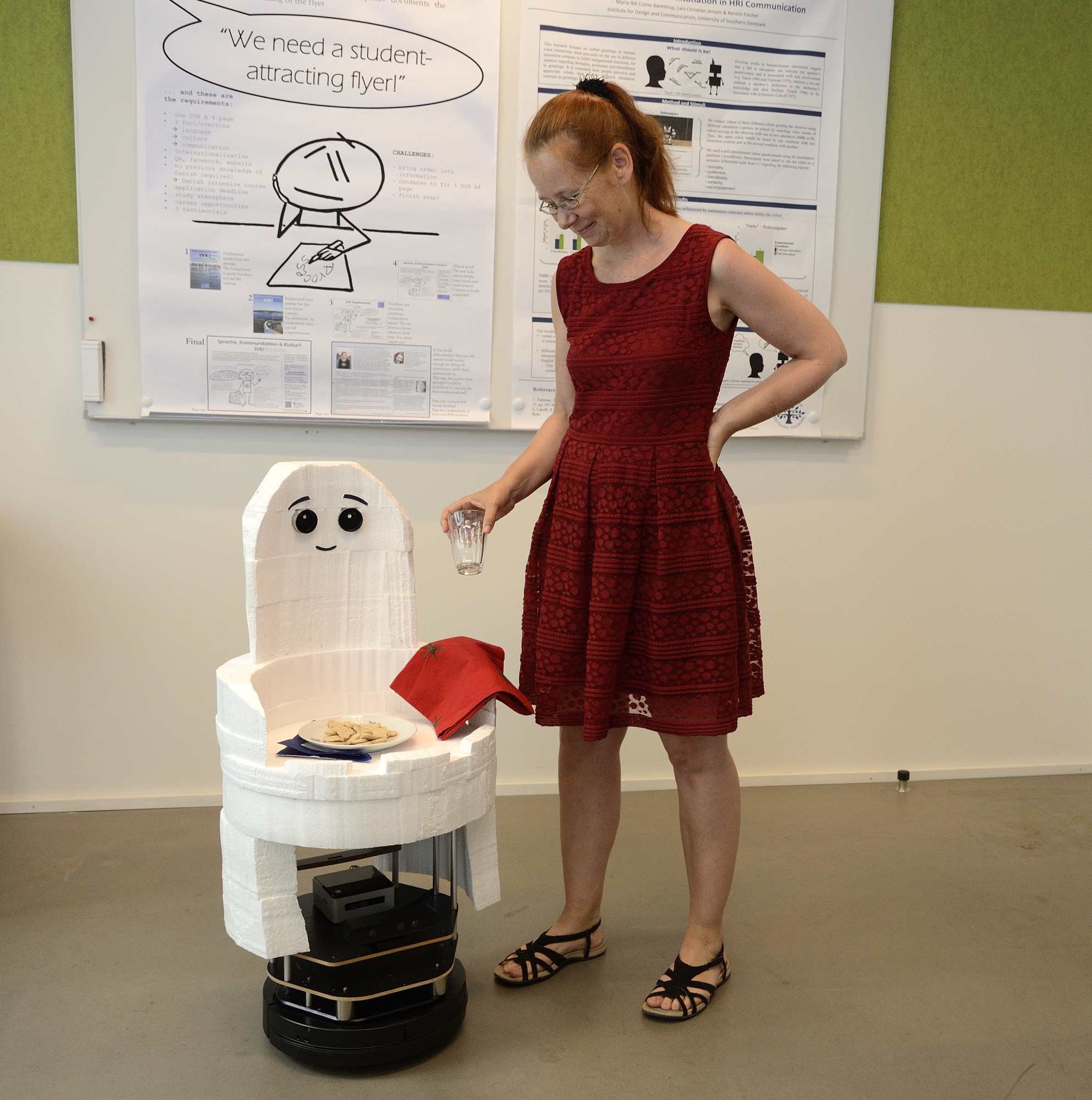 Kerstin Fischer experimenting with Casper robot for SMOOTH project.