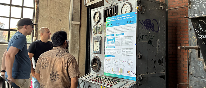 Researchers looking at poster