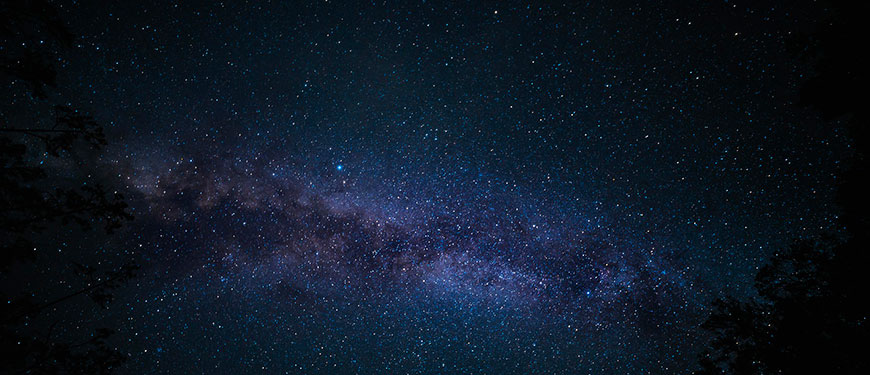 Look into space, darkness and stars