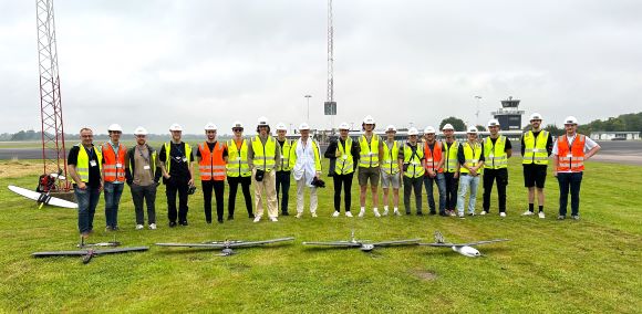 2024 Composite Lab Summer School Group at the field outside HCA airport