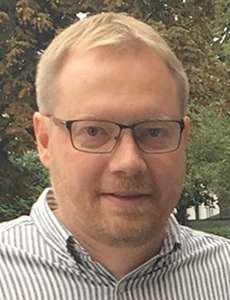 Picture of associate professor Michael Lomholt