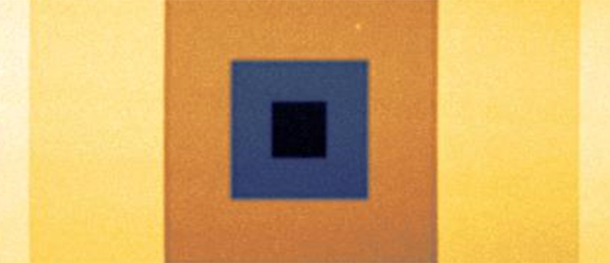 AFM image of a micro pyramid with nested square features centered on an orange and yellow surface.