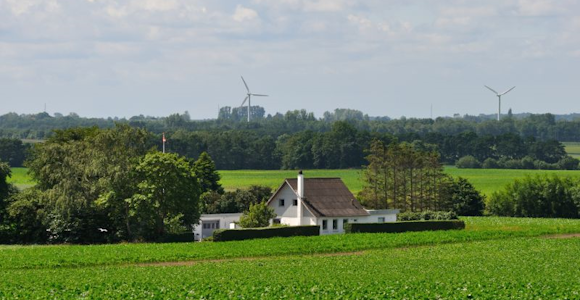 Landscape with a house, trees and fields