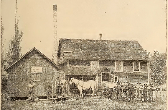 Gammelt fotografi af Slifsgaard mejeri, fredsville, Iowa.