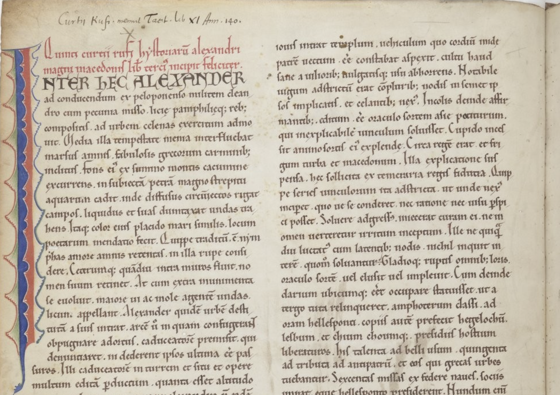 Old manuscript page with two columns of Latin handwriting and a colorful illuminated initial on the left, including the text “INTER HEC ALEXANDER”.
