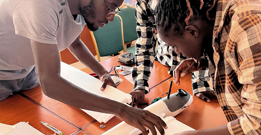Students working on fixed wing drone