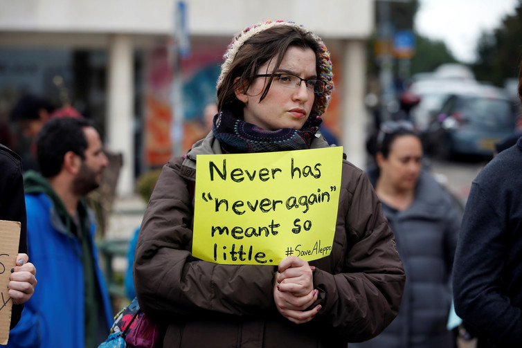 A protester in Israel echoes the thoughts of many in the international community. Baz Ratner/Reuters