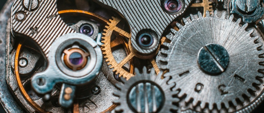 Close-up of gears in a clock