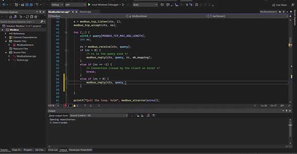 Civilingeniører i Robotteknologi fra Syddansk Universitet koder en robothånd