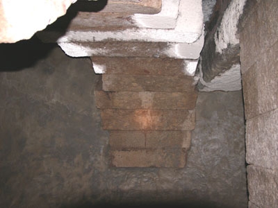 Fig. 29. Cistern in sector 3. Very similar to the cistern under the Naillac Building, except that one half roof is supported by a (later?) arch.