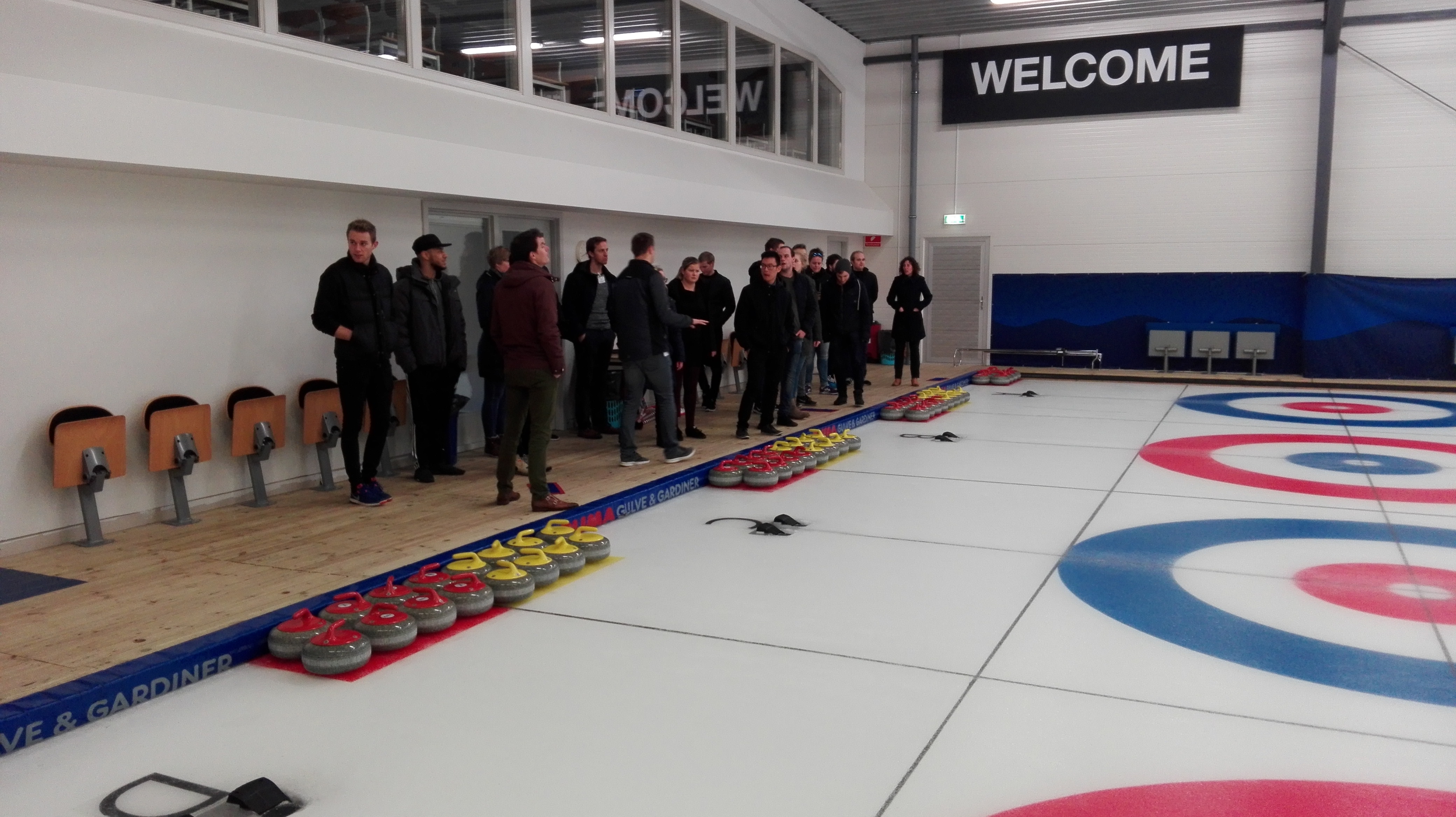 Students looking at curling facilities