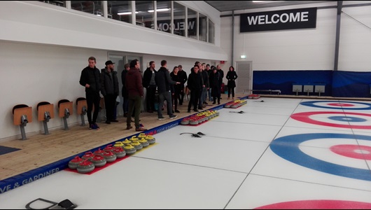 Students looking at curling facilities