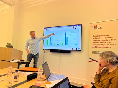 Man from the TeleGraft project presenting