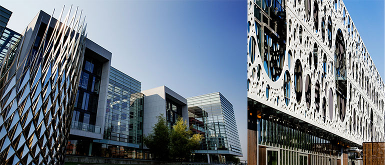 Tilt up view of Alsion front seen from the harbour side, and to the right the front of the TEK building in Odense