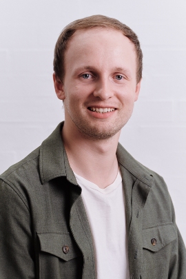 portrait photo of center member Oliver Van Zwol