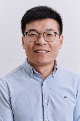 portrait photo of center member Yaxu Wang