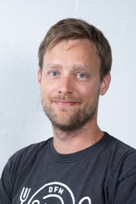 Portrait photo of ATLAS center member Rasmus Rydbirk
